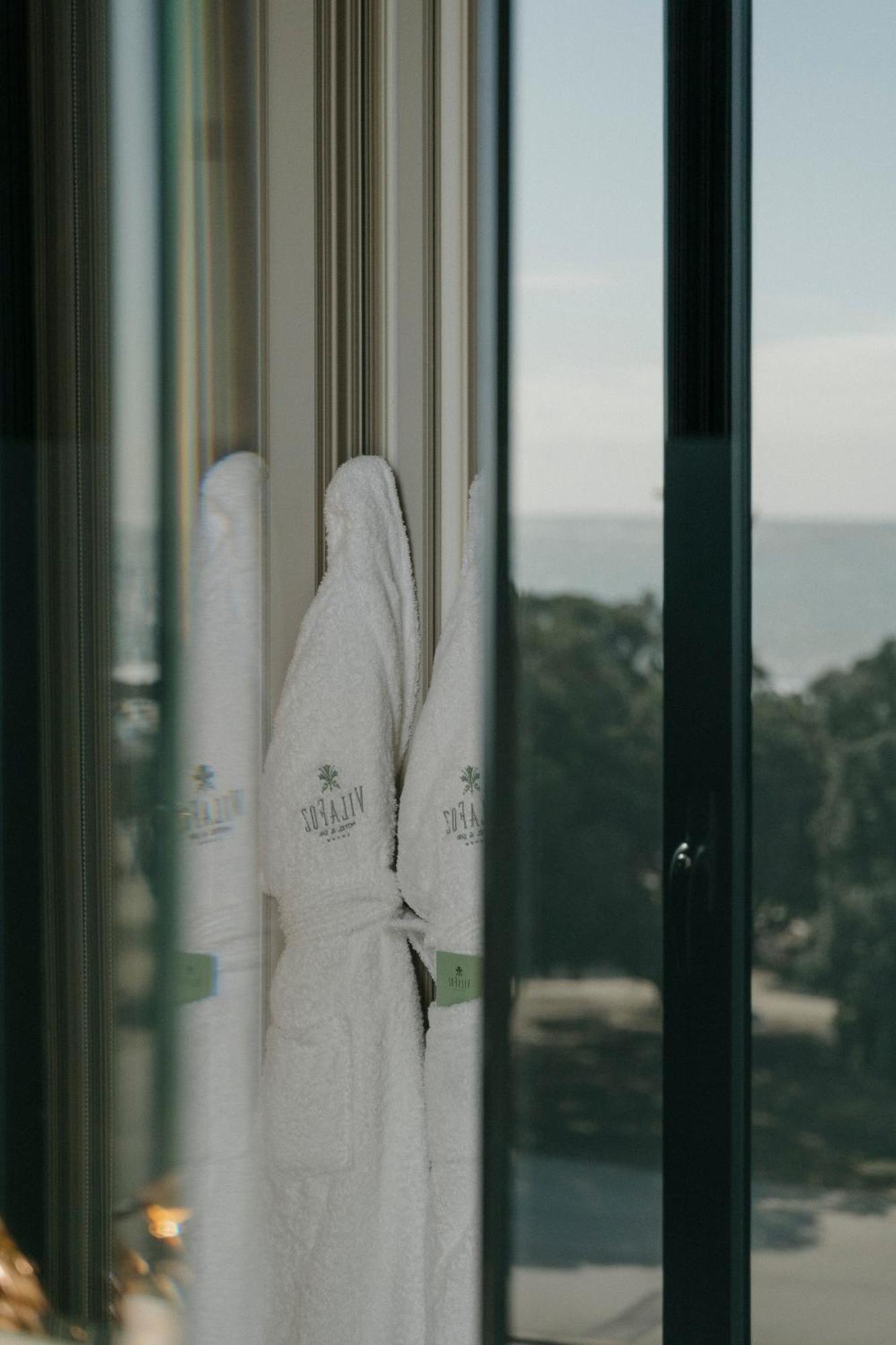 วีลา ฟอซ โฮเต็ล แอนด์ สปา Hotel ปอร์โต ภายนอก รูปภาพ Towels in a hotel room